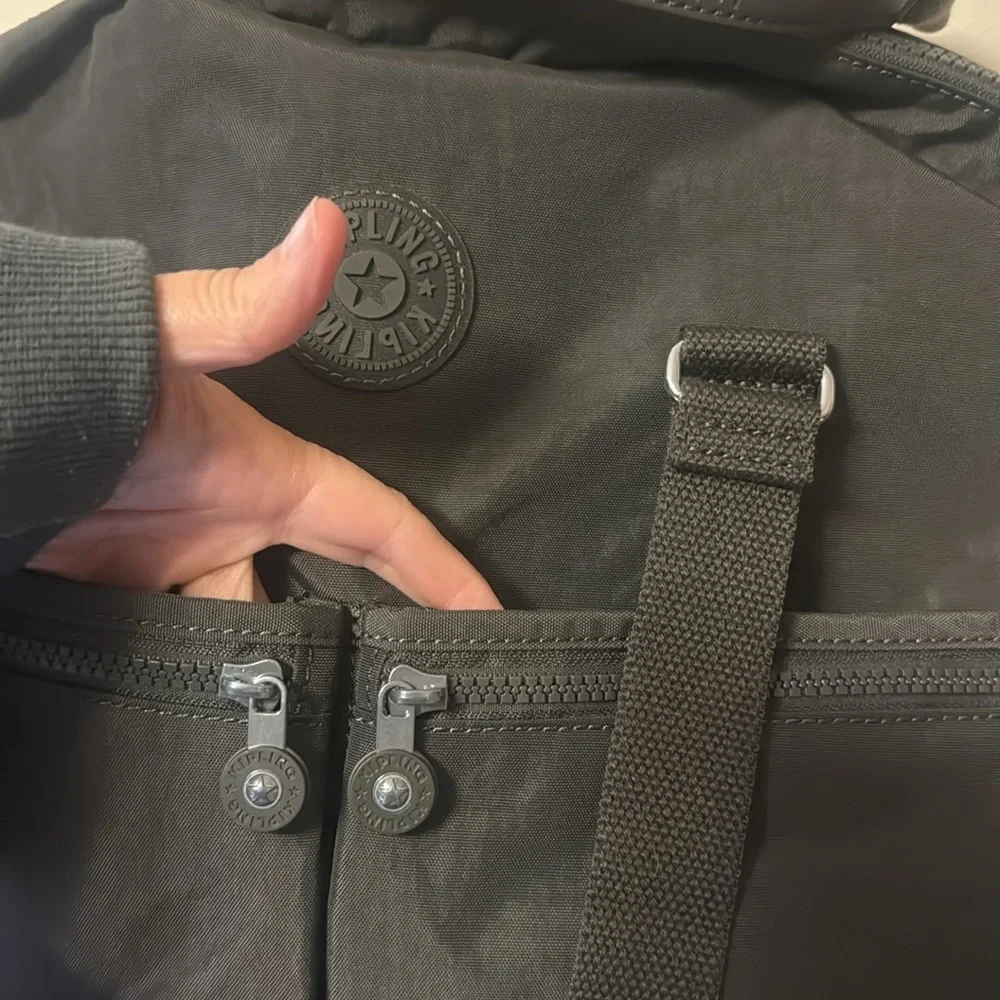 Kipling Black Duffel Bag, new, outside pockets, inside pockets, unisex